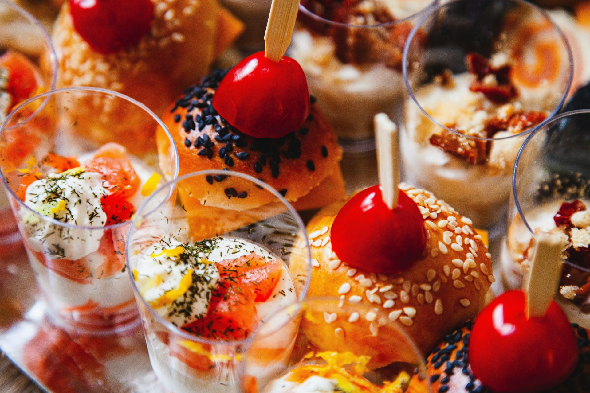 a group of glasses with food in them